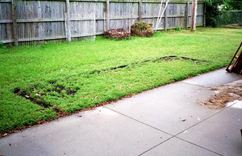 plastic border around the garden plot
