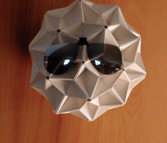 photo of an origami ball with sunglasses